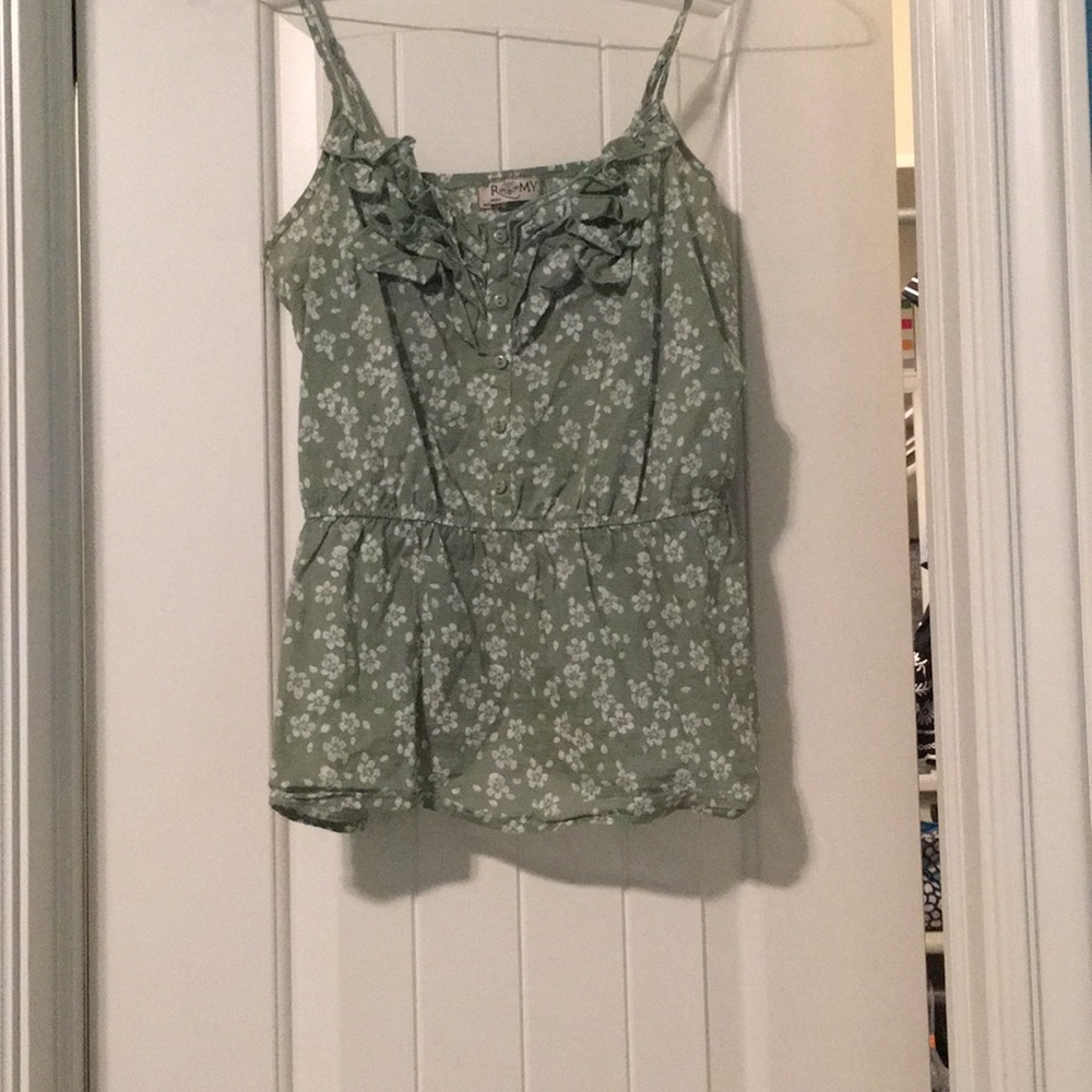 Green and white floral blouse